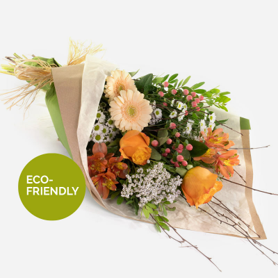 Peaches and Cream - A beautiful collection of flowers simply wrapped and ready to arrange.
